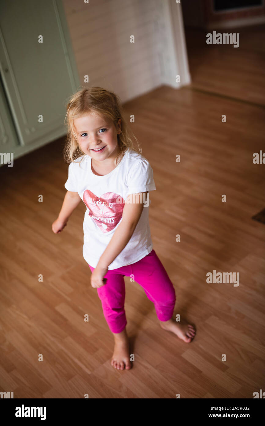 Smiling girl looking at camera Stock Photo