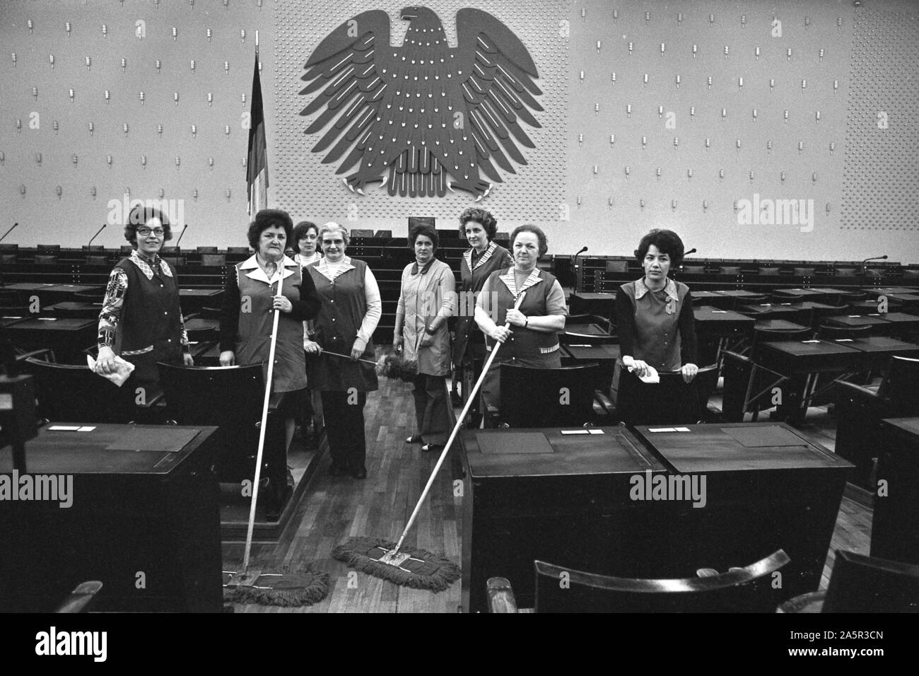 Cleaning ladies, cleaning staff in the plenary hall, posing for a group