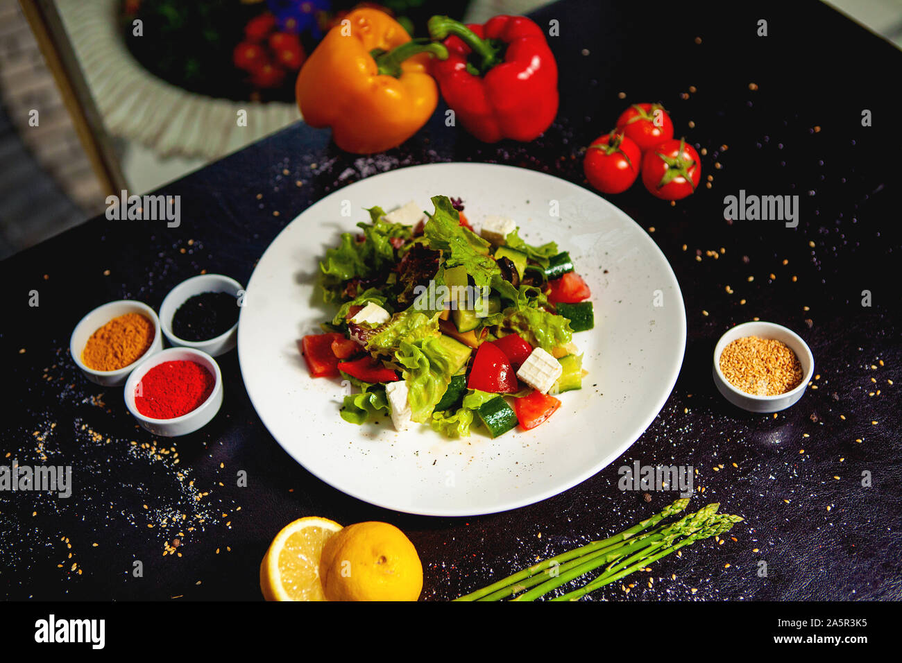 lettuce salad with white cheese, cucumber and tomato Stock Photo