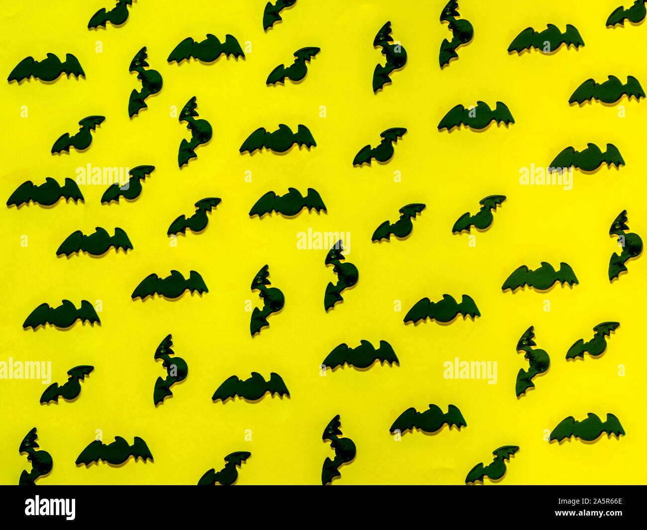 Bat pattern for halloween on yellow background Stock Photo - Alamy