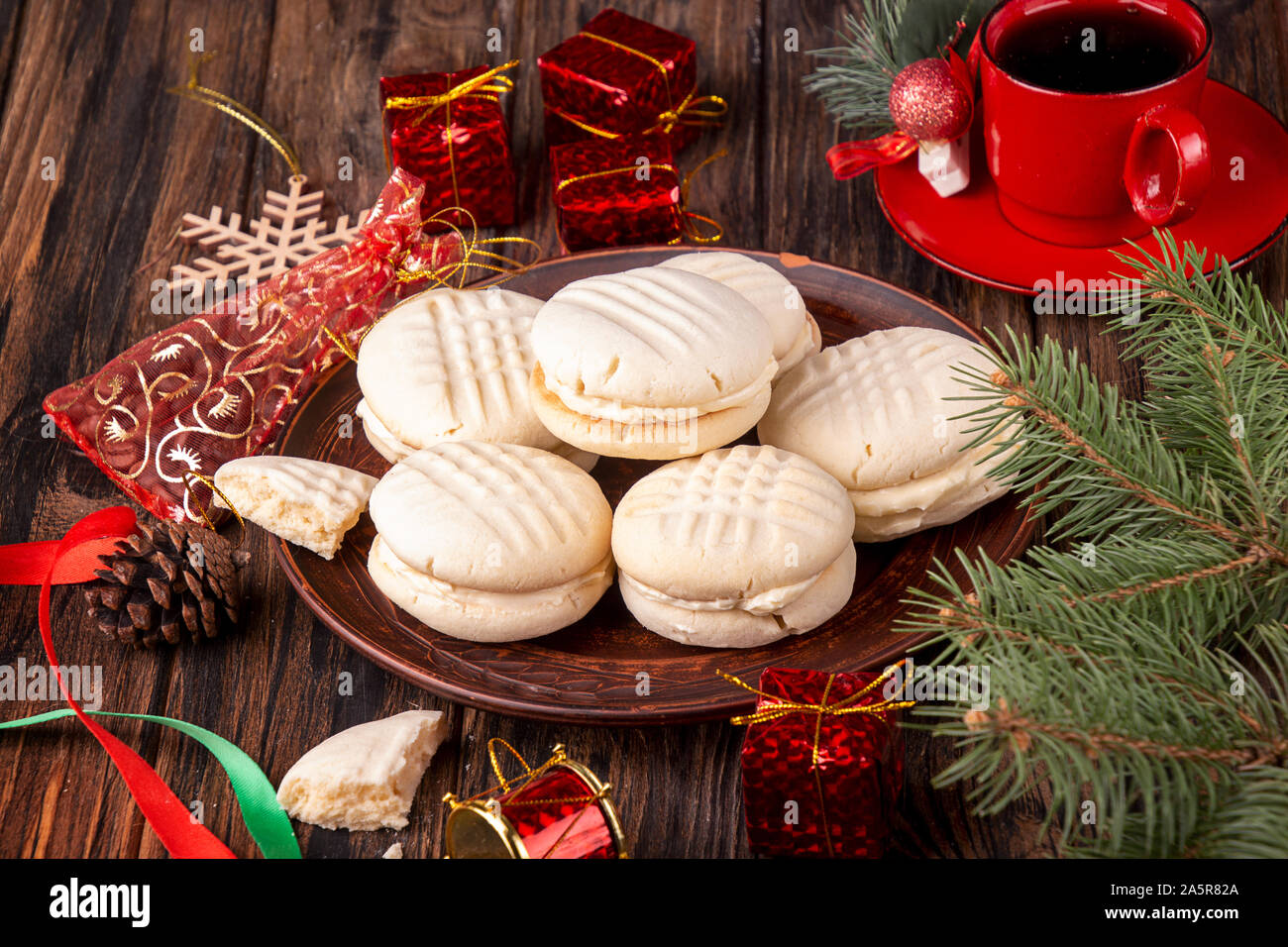 Traditional american Christmas cookies biscuits Melting Moments on wooden background.. Christmas New Year ornament decorations. Stock Photo