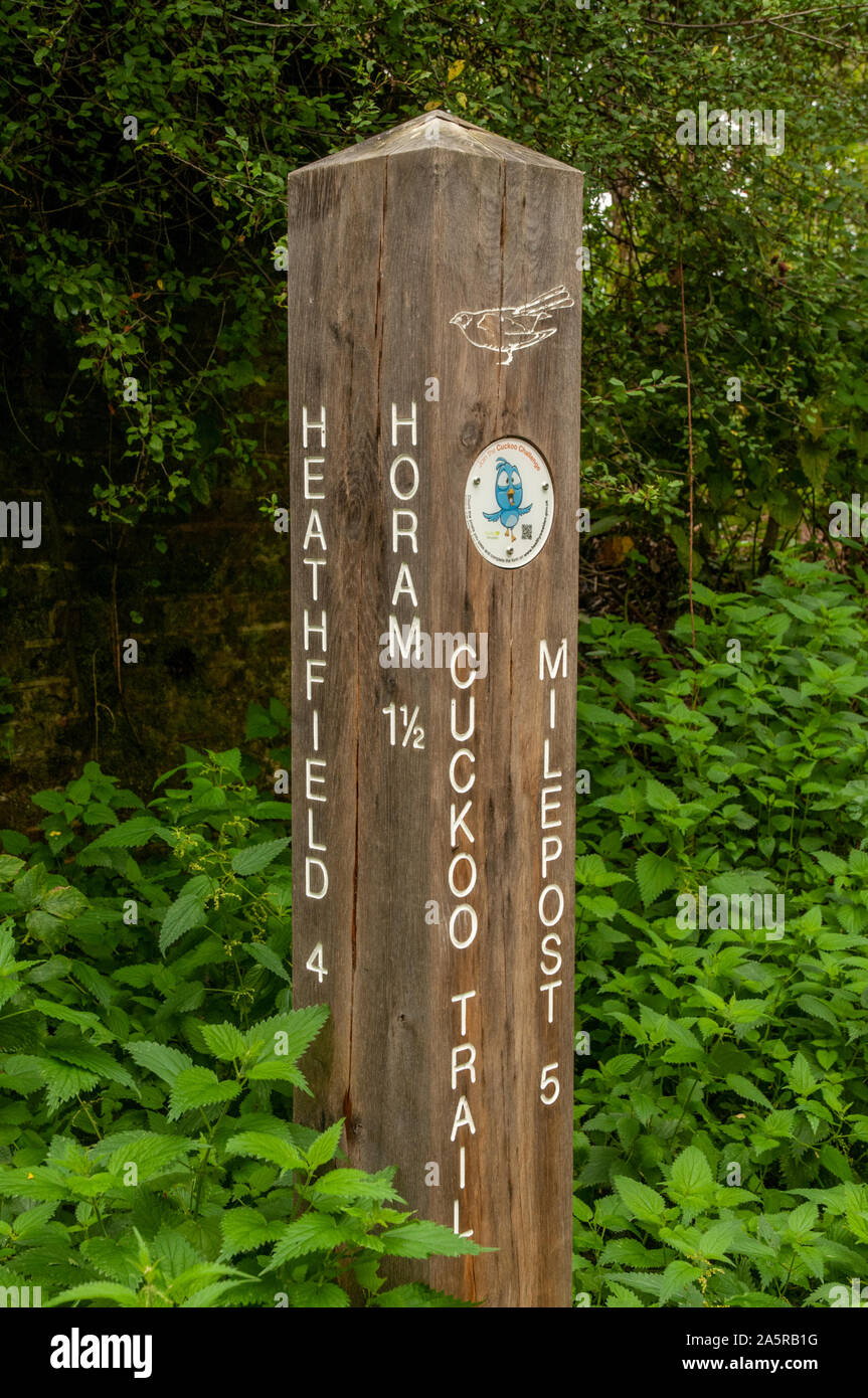 Milepost on the Cuckoo Trail footpath and cycleway between Horam village and Heathfield, East Sussex, England. Stock Photo