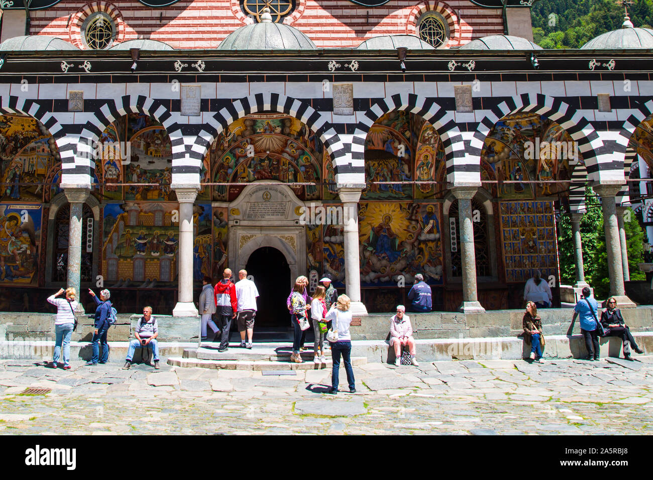 Rila, Bulgaria - June, 25, 2015: People near the church in Unesco World Heritage site famous Rila Monastery, Rilsky monastery Stock Photo