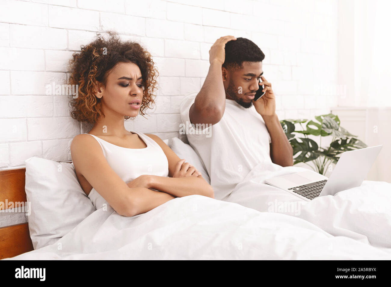 Woman husband in bed feeling hi-res stock photography and images - Alamy