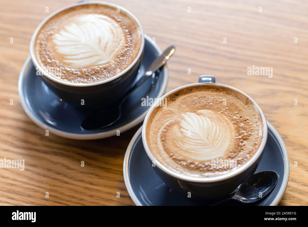 Two Drinking Cups of Lavazza Coffee isolated on a White Background Stock  Photo - Alamy