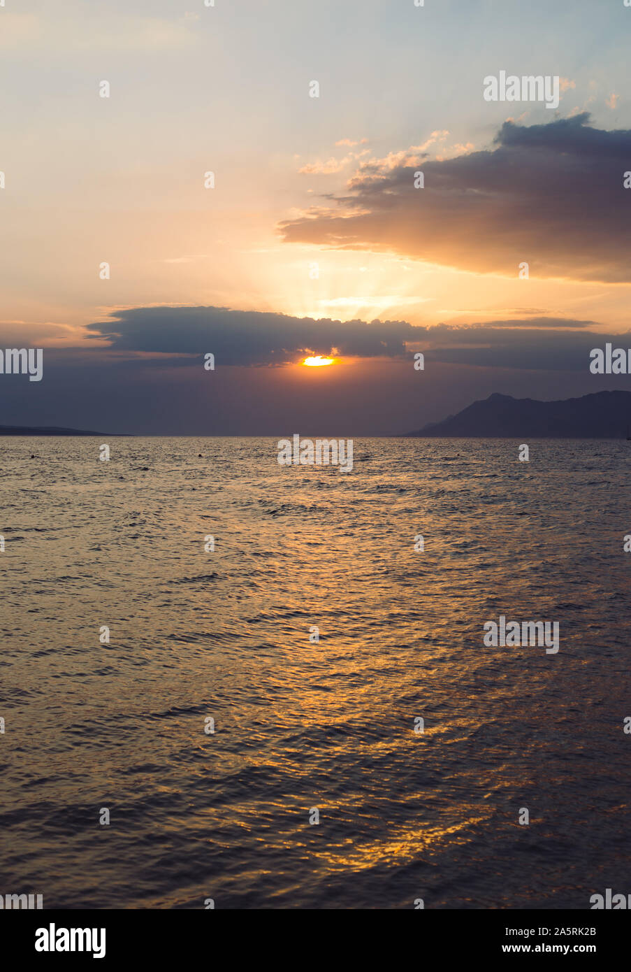 Reflection rays sunset in sea hi-res stock photography and images - Alamy