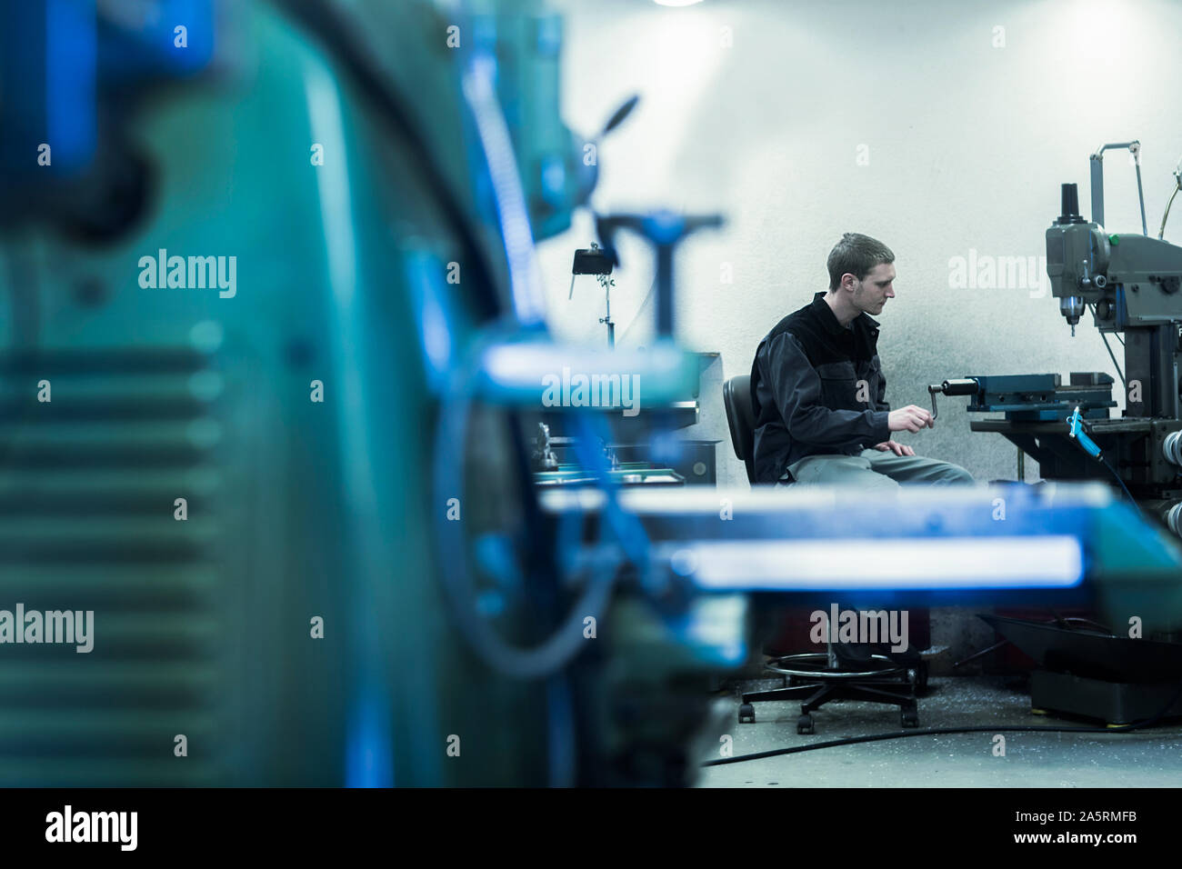 engineer in a workshop working Stock Photo