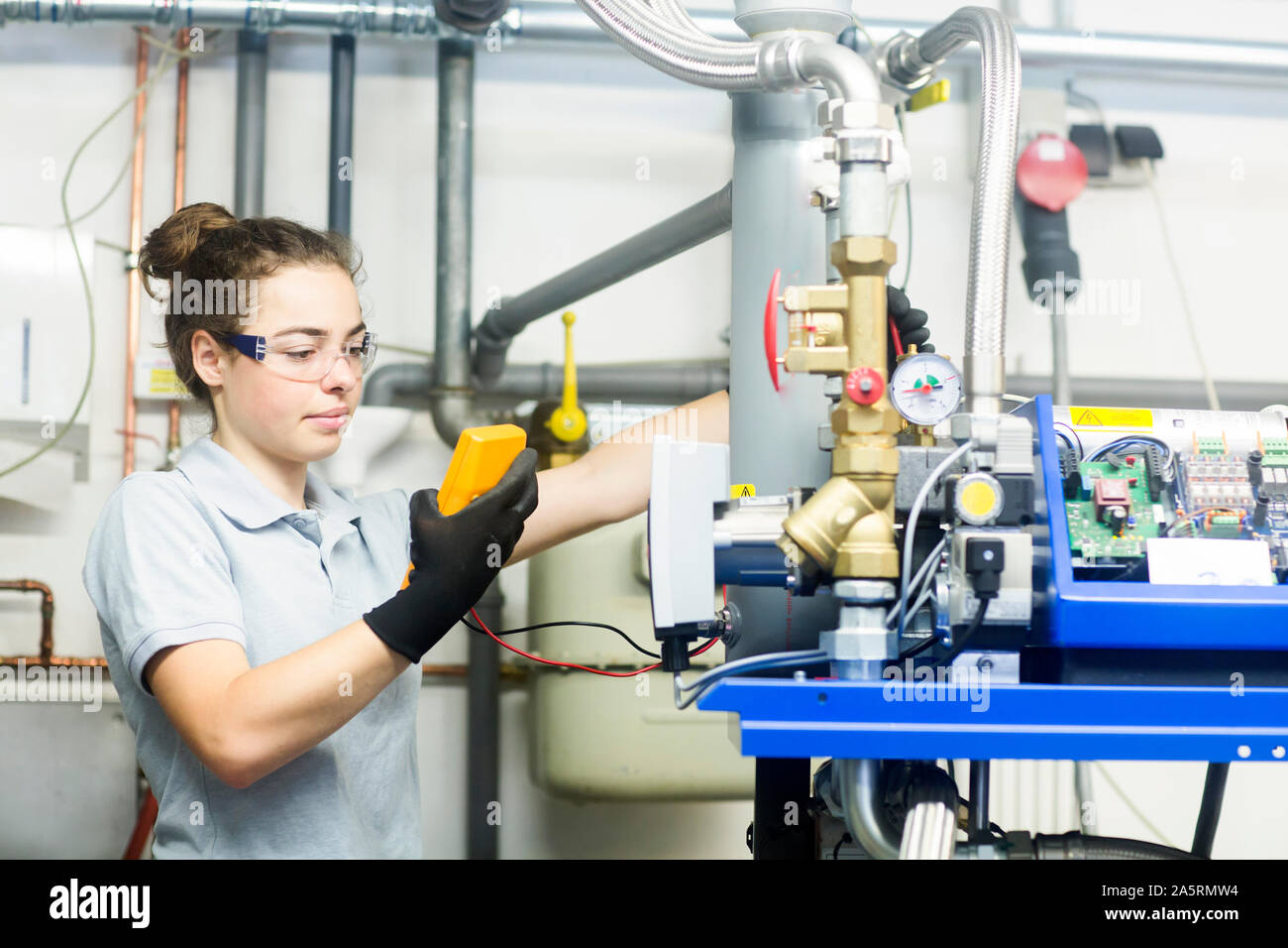 block heat and power plant engineer female Stock Photo Alamy