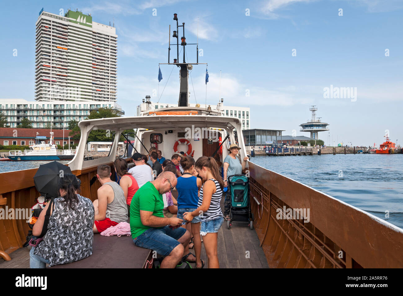 Passengers on the Priwall passenger ferry crossing the Trave in Travemuende, Luebeck on the Baltic Sea, Germany. Stock Photo