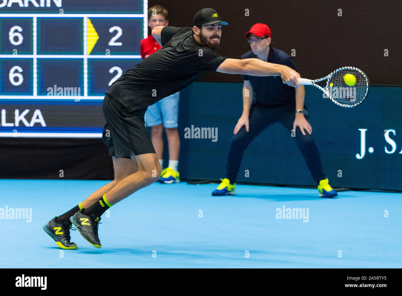 St. Jakobshalle, Basel, Switzerland. 22nd Oct, 2019. ATP World Tour Tennis,  Swiss Indoors; Reilly Opelka (USA) returns a serve against Christian Garin  (CHI) - Editorial Use Credit: Action Plus Sports/Alamy Live News
