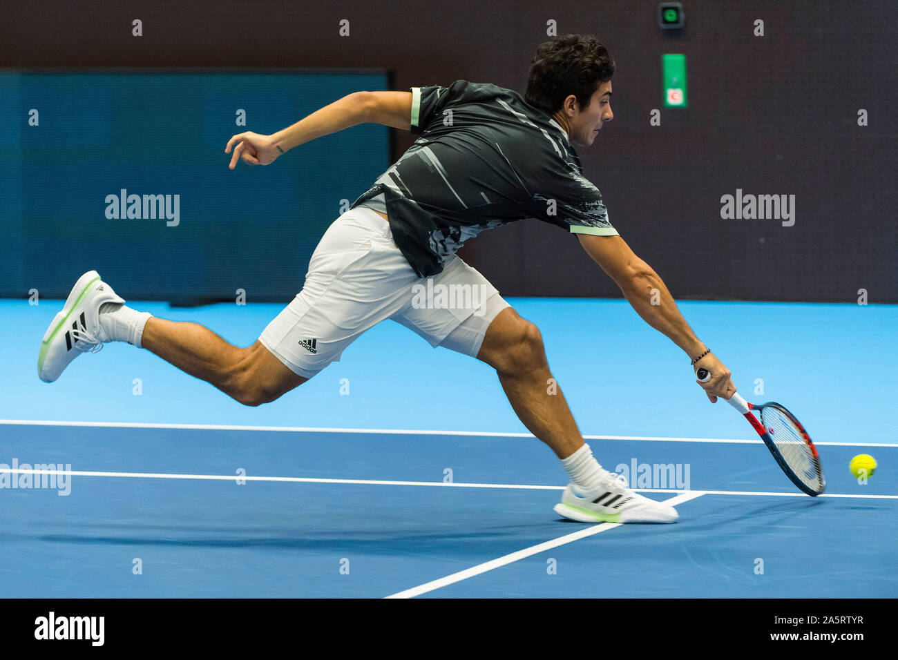 St. Jakobshalle, Basel, Switzerland. 22nd Oct, 2019. ATP World Tour Tennis,  Swiss Indoors; Christian Garin (CHI) chases down a dropshot against Reilly  Opelka (USA) - Editorial Use Credit: Action Plus Sports/Alamy Live