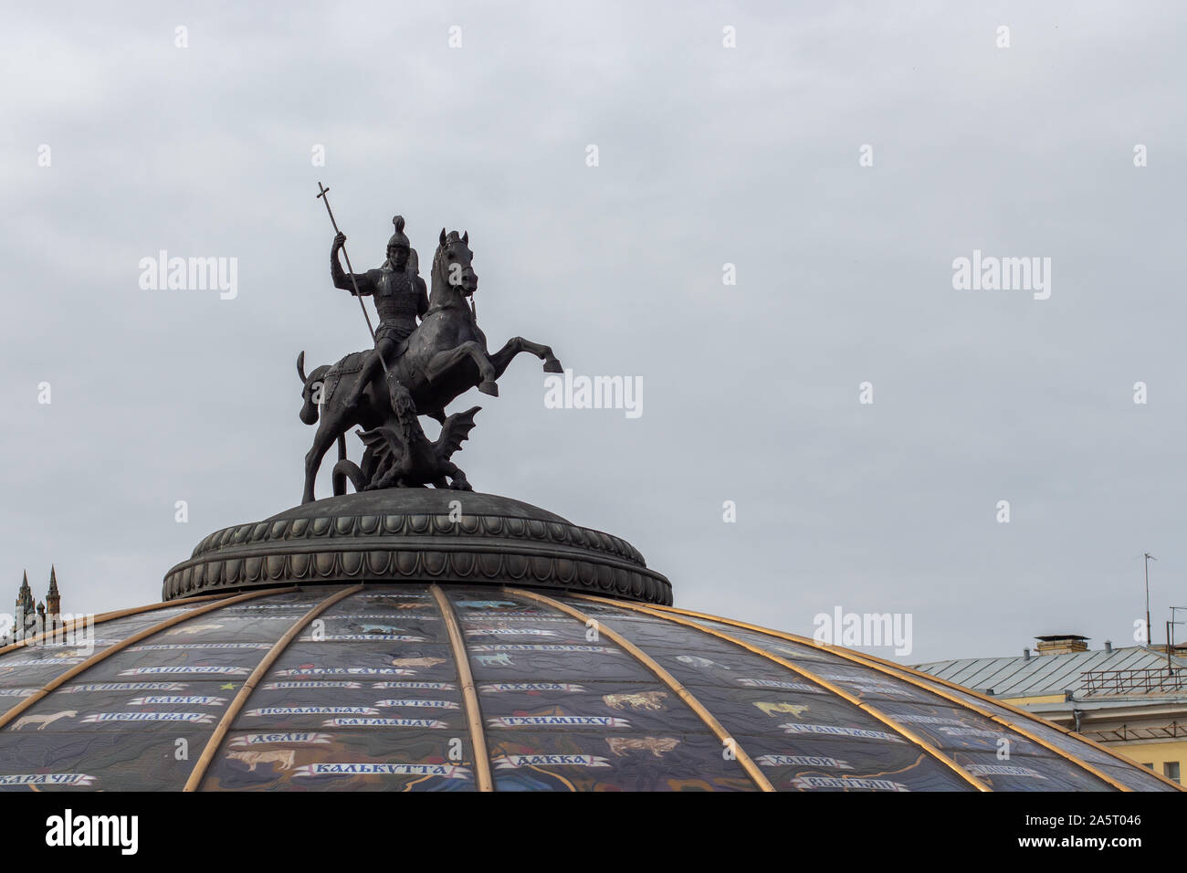 12-10-2019, Moscow, Russia. George the Victorious on a horse kills a dragon snake. Coat of arms of Moscow bronze equestrian sculpture warrior on a gla Stock Photo