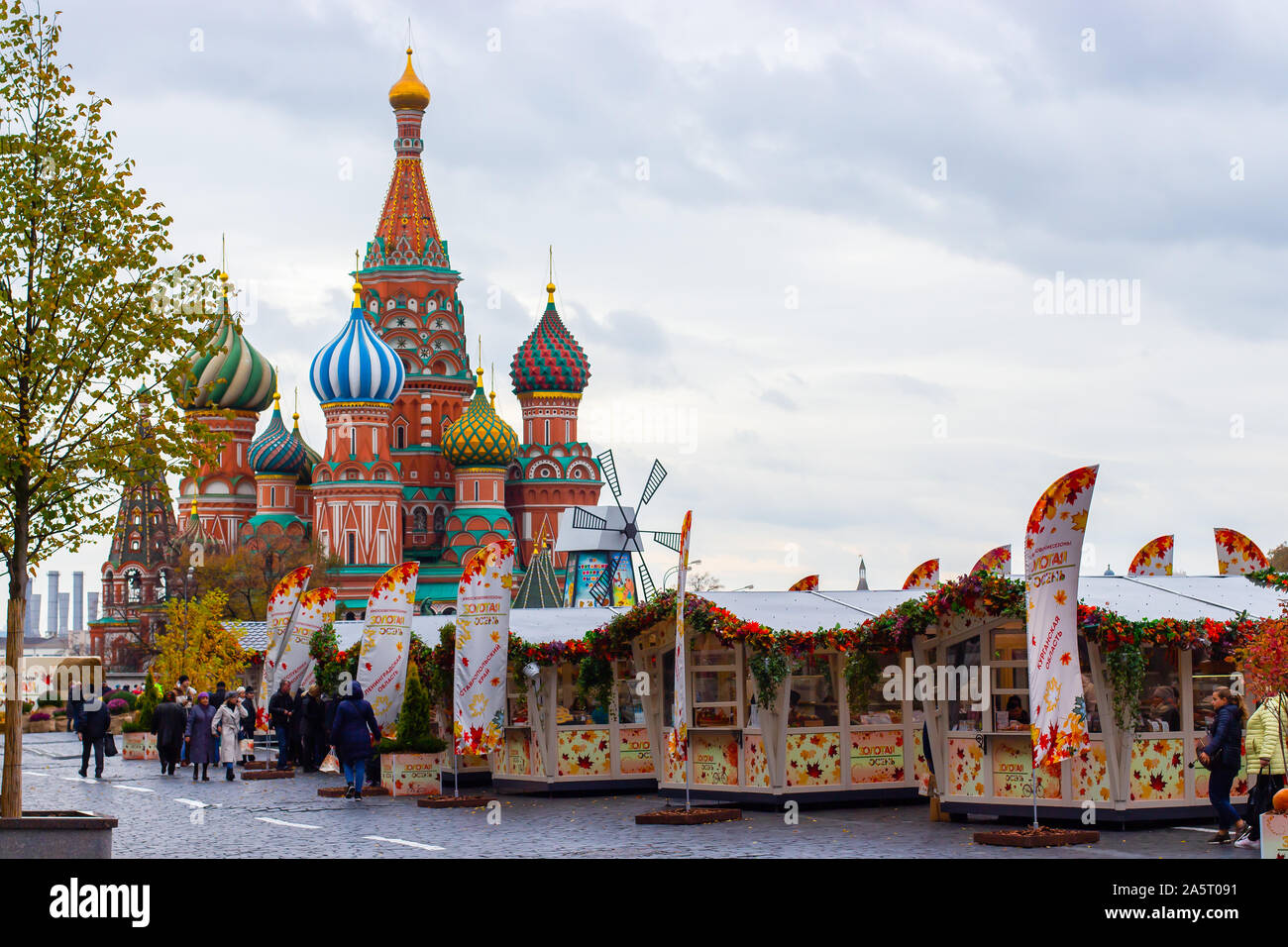 12-10-2019, Moscow, Russia. Golden Autumn Festival at Red Square. Stalls with food and gifts in the background Cathedral of St. Basil, symbol Stock Photo
