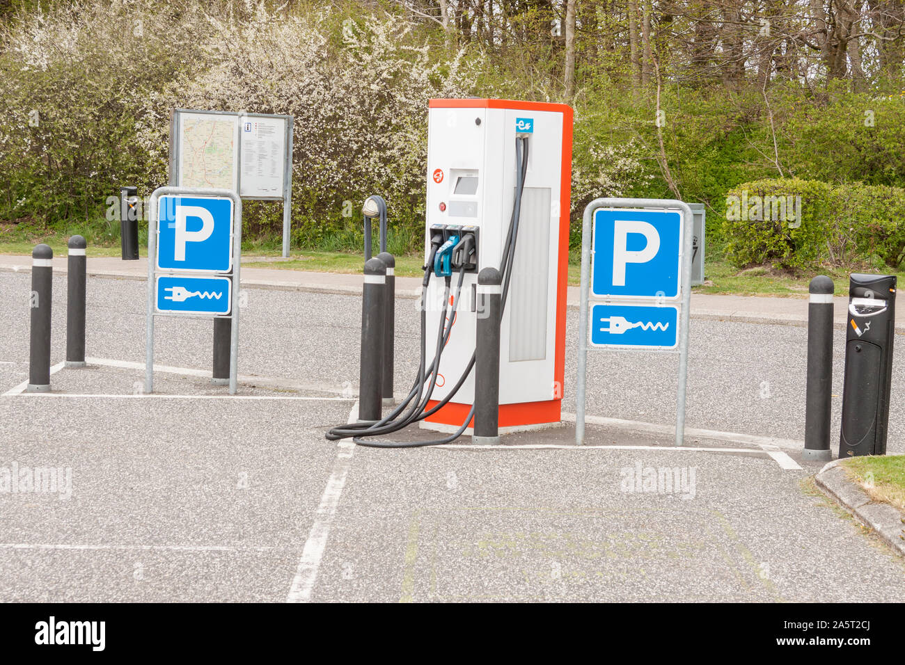 Small electric car charging station in Denmark Stock Photo Alamy