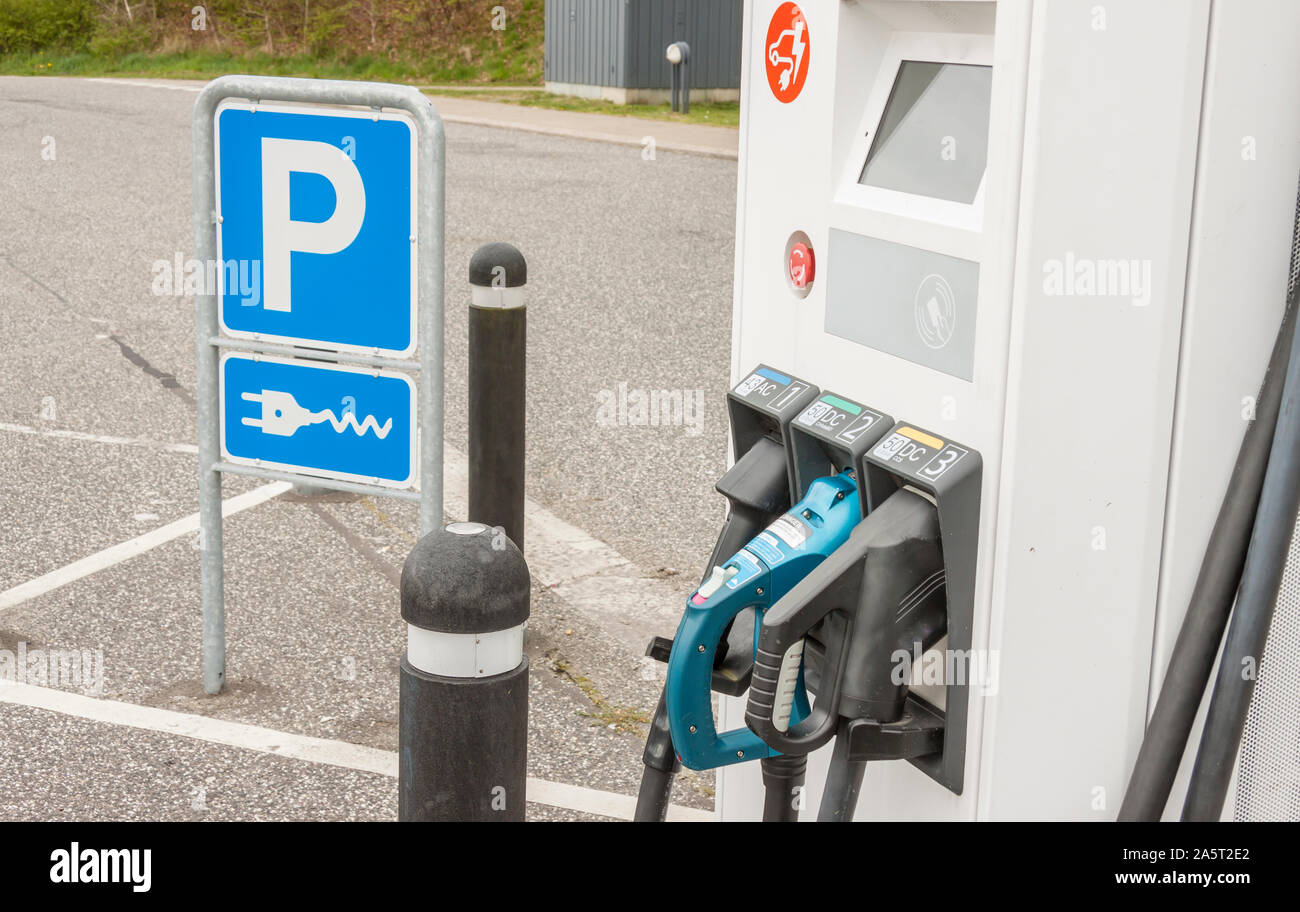 Small electric car charging station in Denmark Stock Photo Alamy