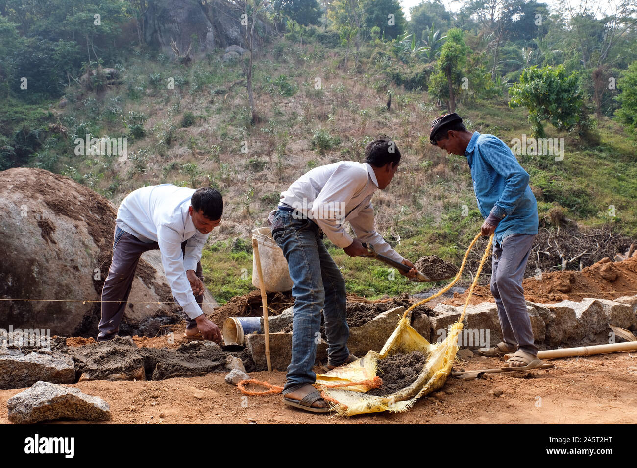 Construction of a new road to the St. Francis Eco-Spirituality Center in Orlong Hada, Meghalaya state, India Stock Photo