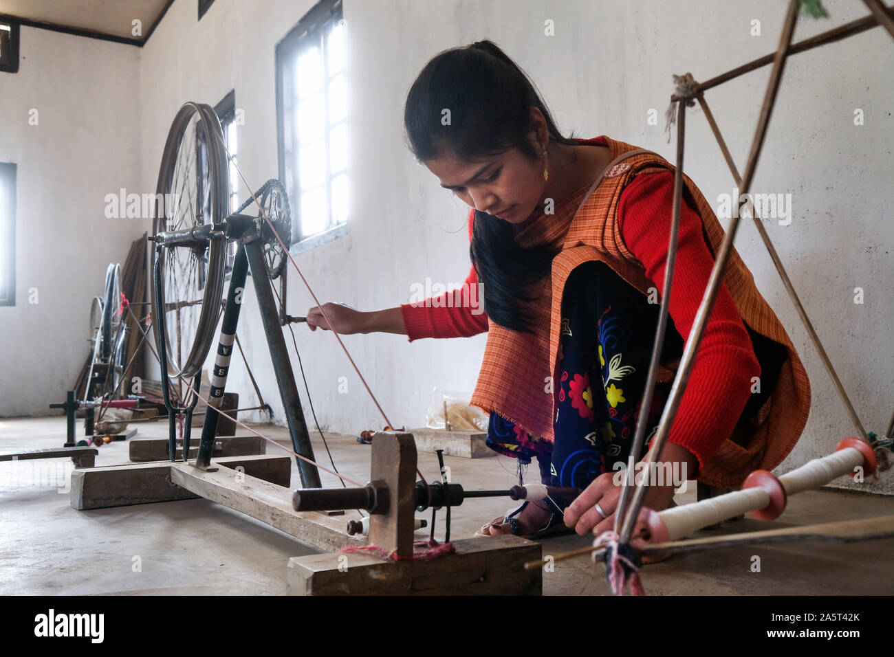 Old woman with spinning wheel hires stock photography and images Alamy