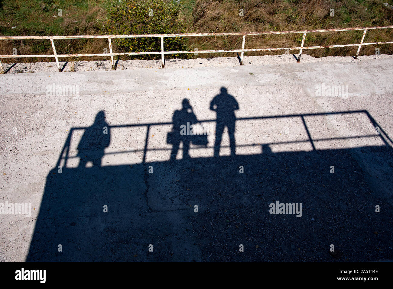 Silhouette and shadows of people On the asphalt Stock Photo - Alamy