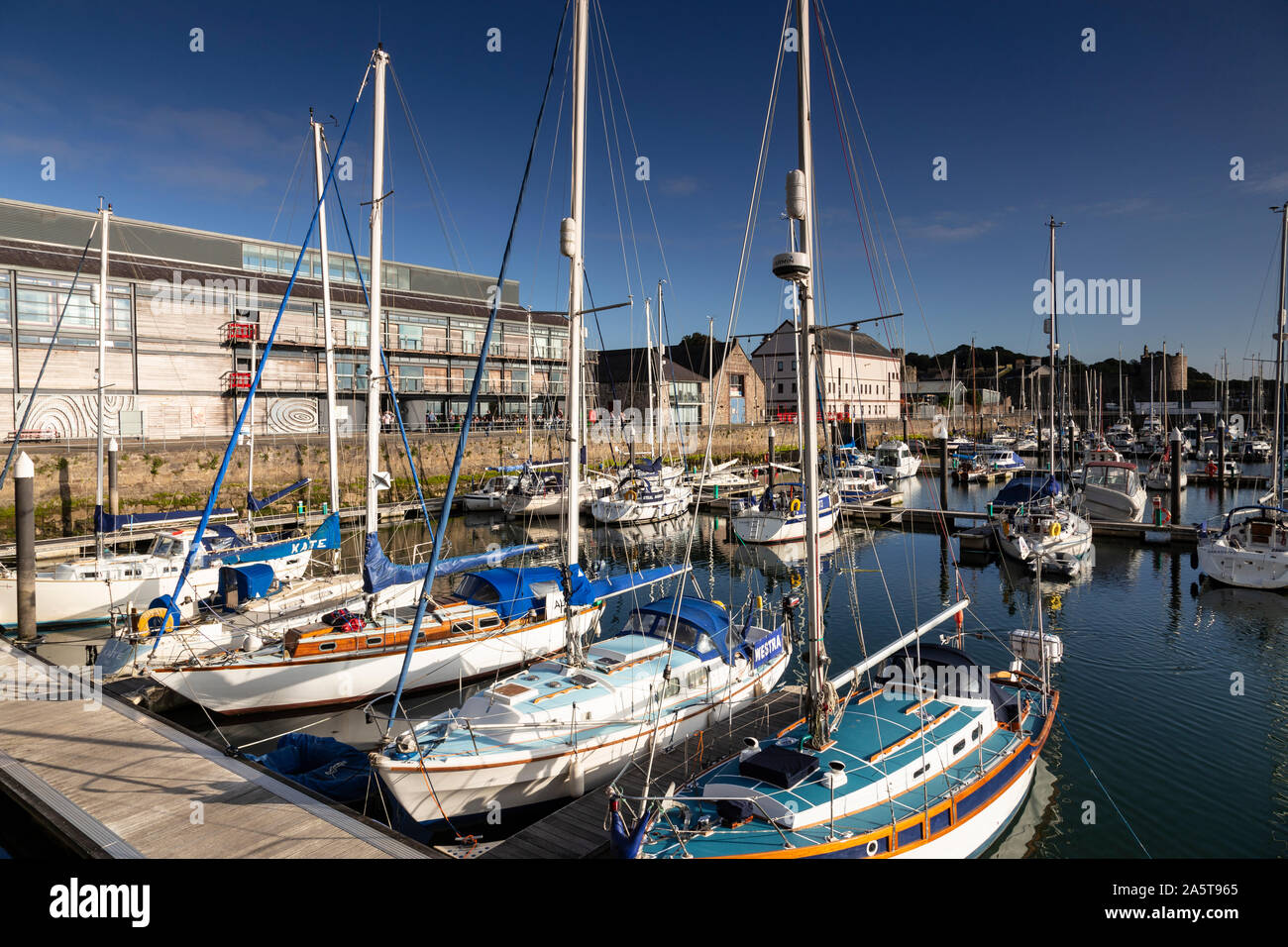 Yachts moored in Victoria Dock, Caernarfon on the North Wales coast Stock Photo