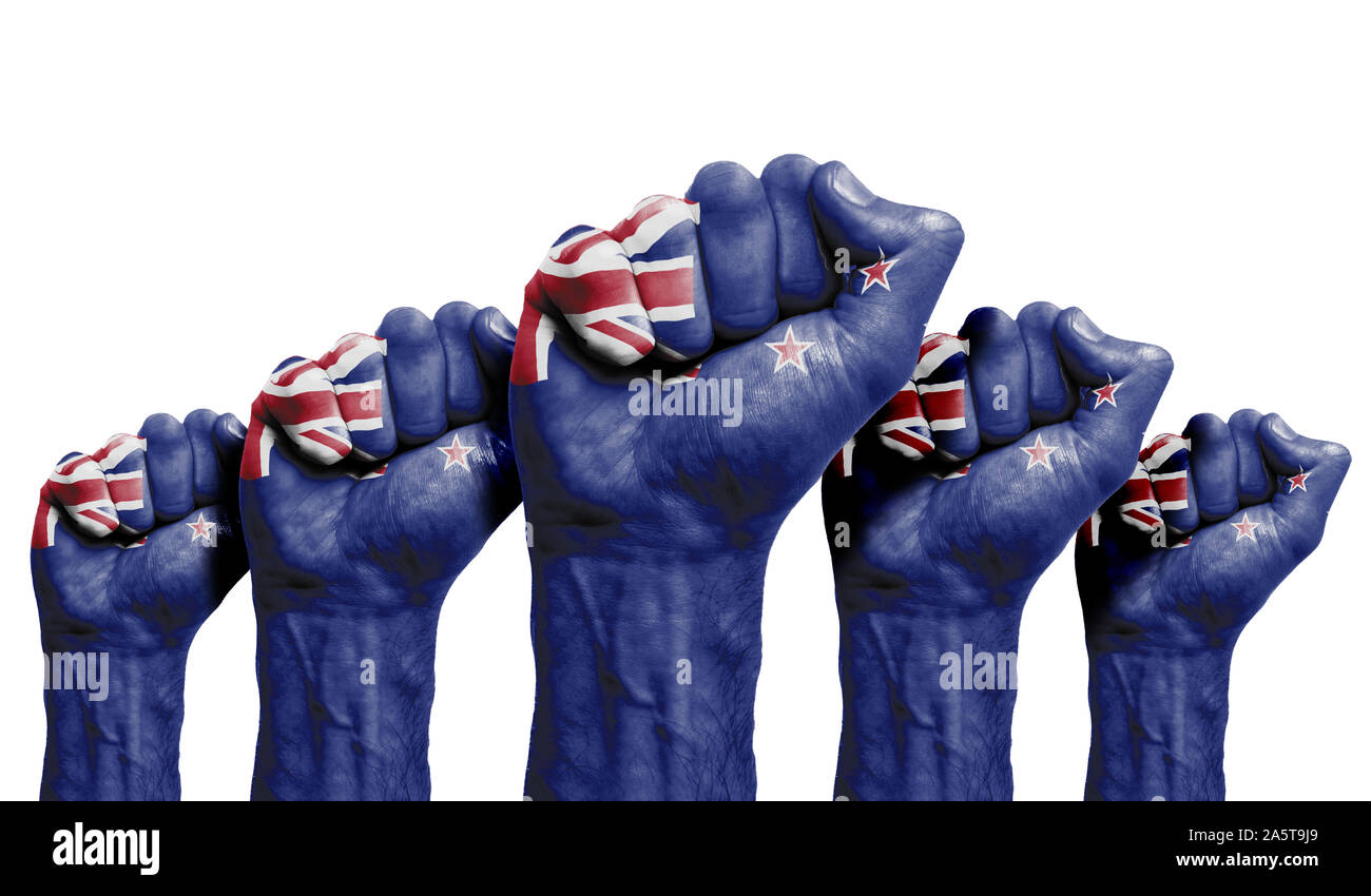 A raised fist of a protesters painted with the New Zealand flag Stock Photo