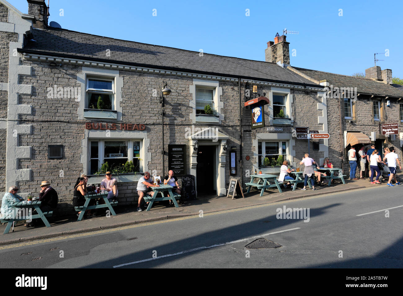 People outside the Bulls Head pub, Castleton village, Derbyshire, Peak ...