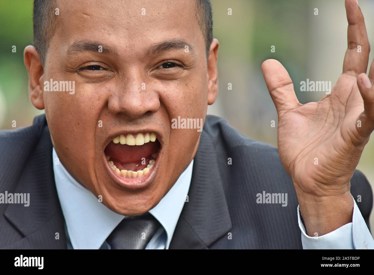 An Angry Business Man Stock Photo - Alamy