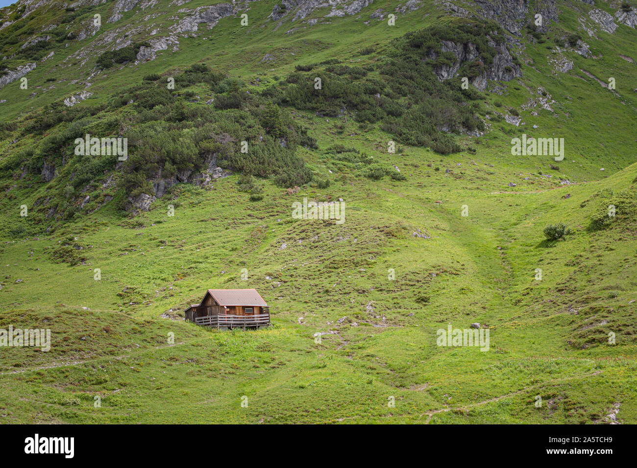 Mountain landscape in the Alps. for relaxation and tourism with the possibility to see cows on the meadows Stock Photo