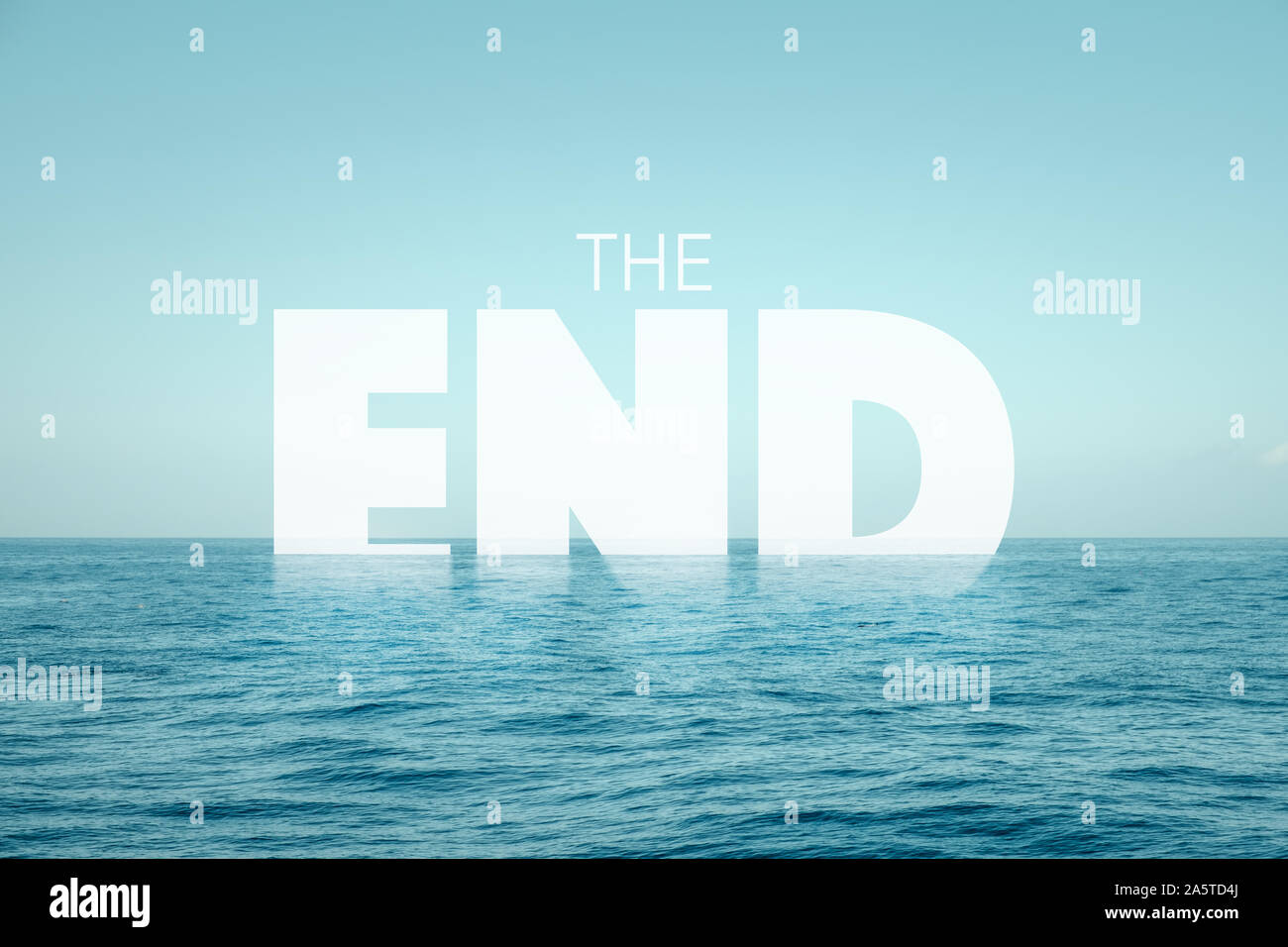 the end text in water with ocean background - climate change concept Stock Photo