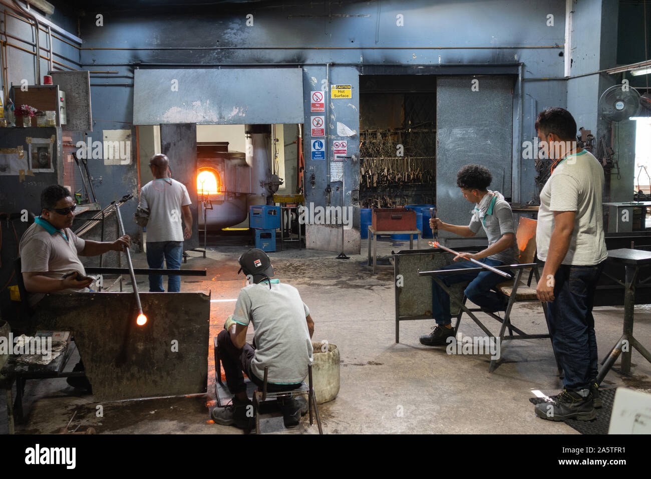 Mauritius glass; glassblowers working in the interior of the Mauritius