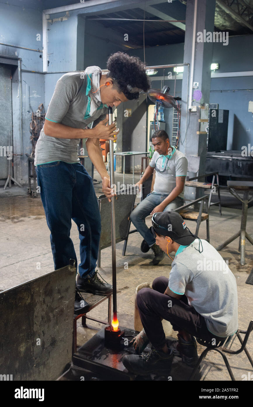 Mauritius glass; glassblowers working in the interior of the Mauritius