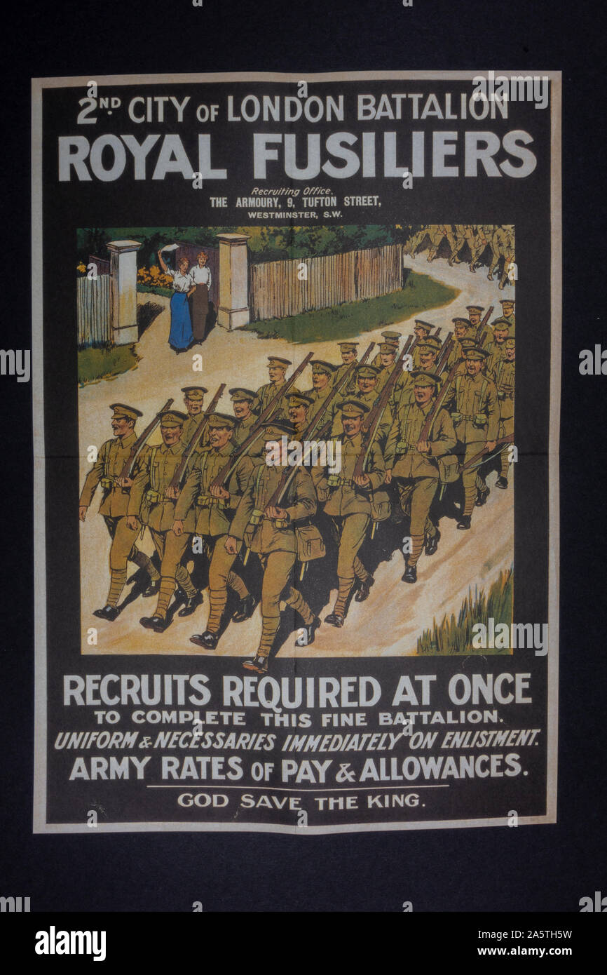 Poster encouraging men to enlist with the Royal Fusiliers, an example of a British WWI poster, a piece of replica memorabilia from the WWI era. Stock Photo