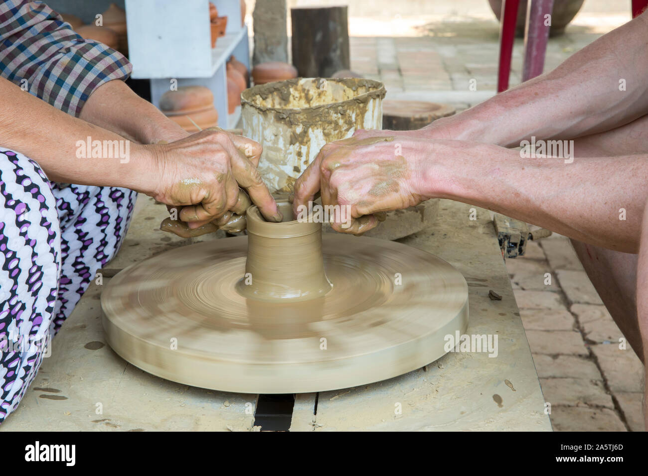 Pottery wheel hands hires stock photography and images Alamy