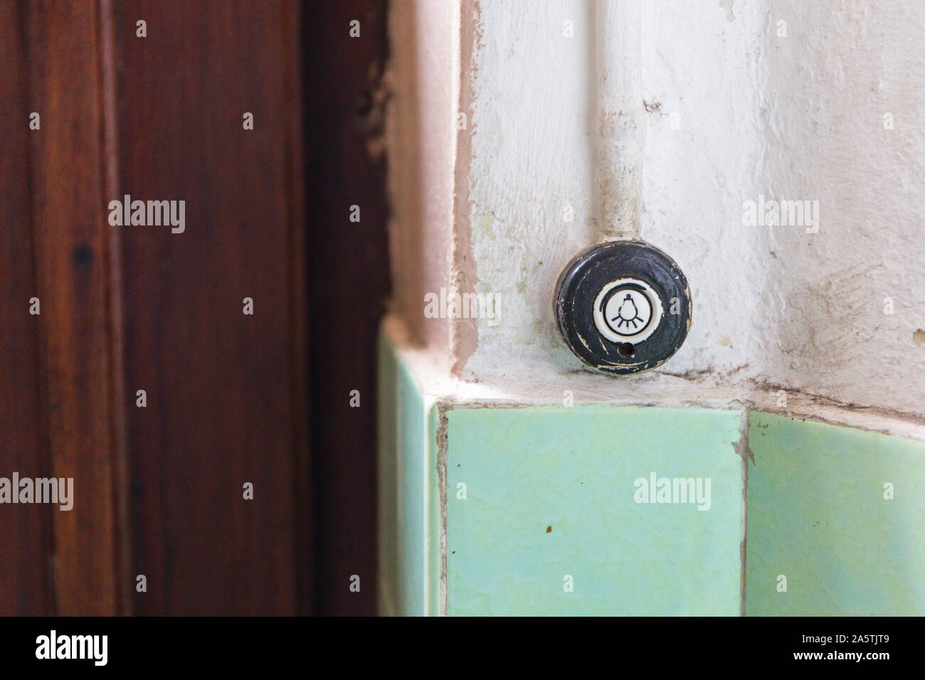 Vintage toggle for light on wall Stock Photo