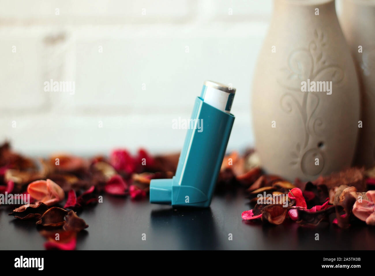 Blueberry Inhaler Medicine and health concept: Blue inhaler. Pharmaceutical product for ...