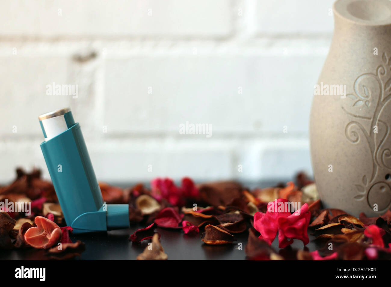 Blueberry Inhaler Medicine and health concept: Blue inhaler. Pharmaceutical product for ...