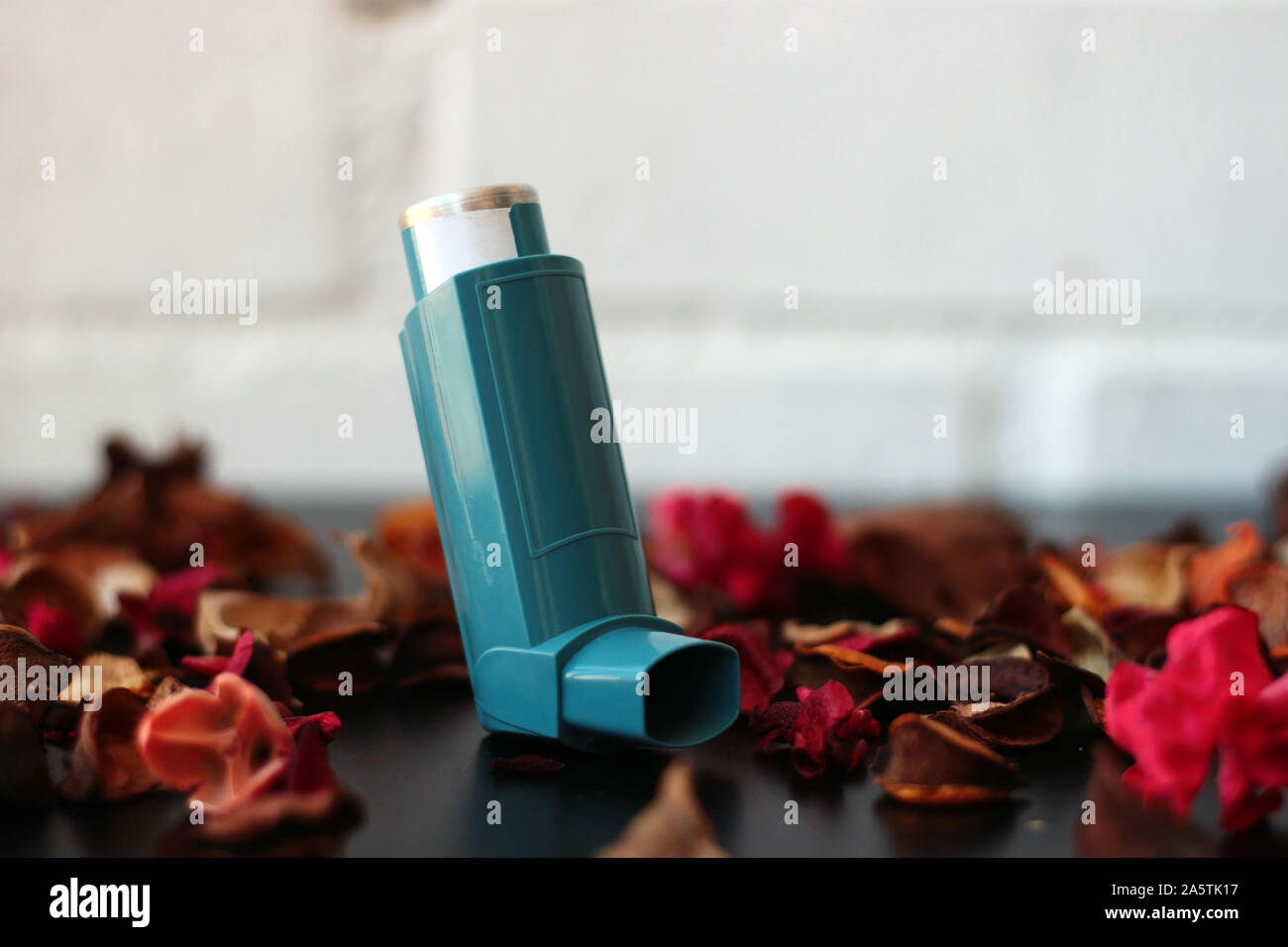 Blueberry Inhaler Medicine and health concept: Blue inhaler. Pharmaceutical product for ...