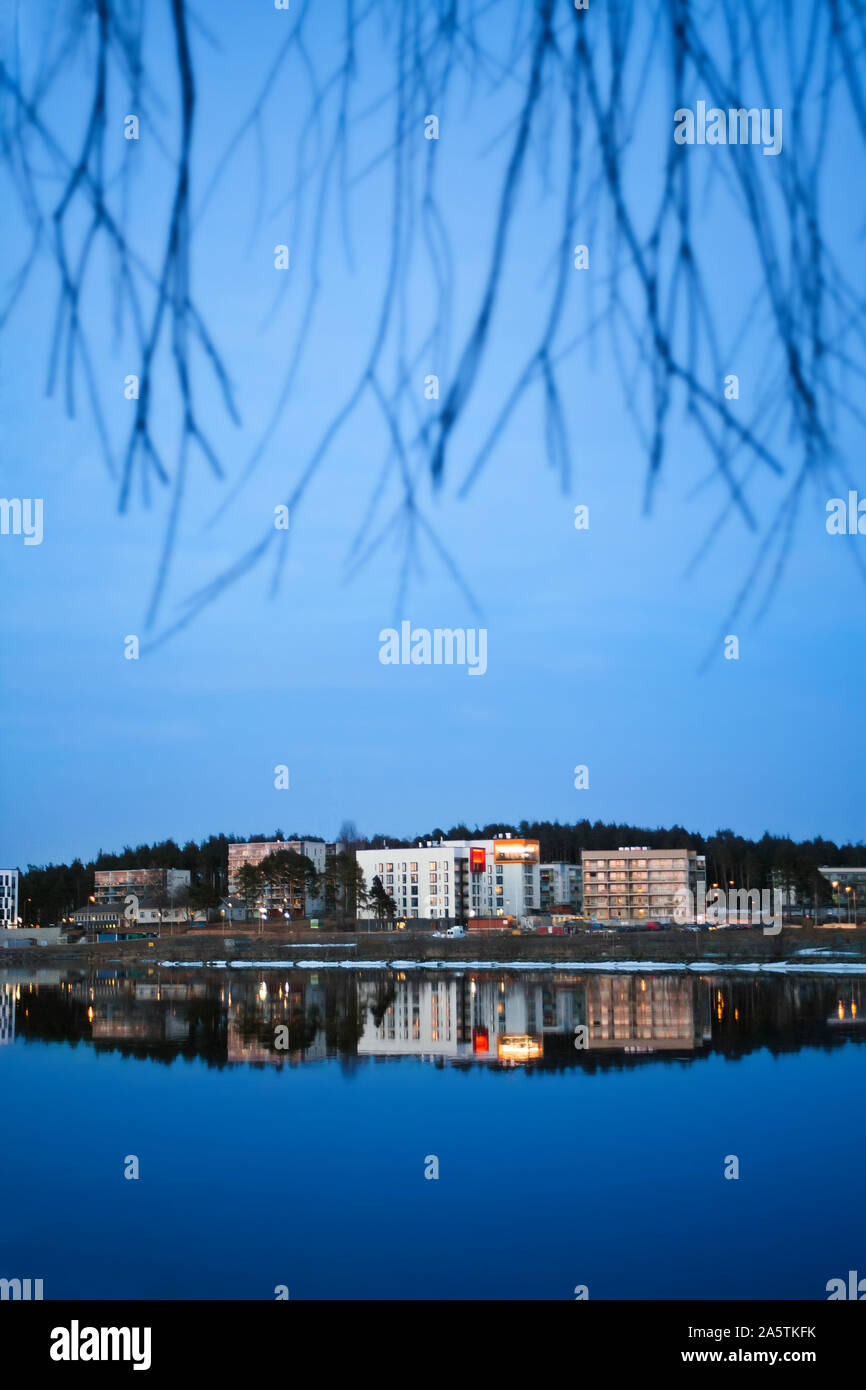 Joensuu city in the evening with river and mirror effect. Finland. Stock Photo