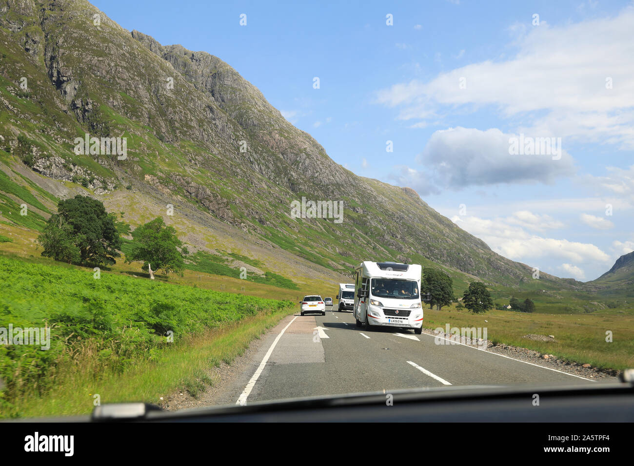 Driving south on the A82 through the spectacular mountains of Glencoe, in the Scottish Highlands, UK Stock Photo