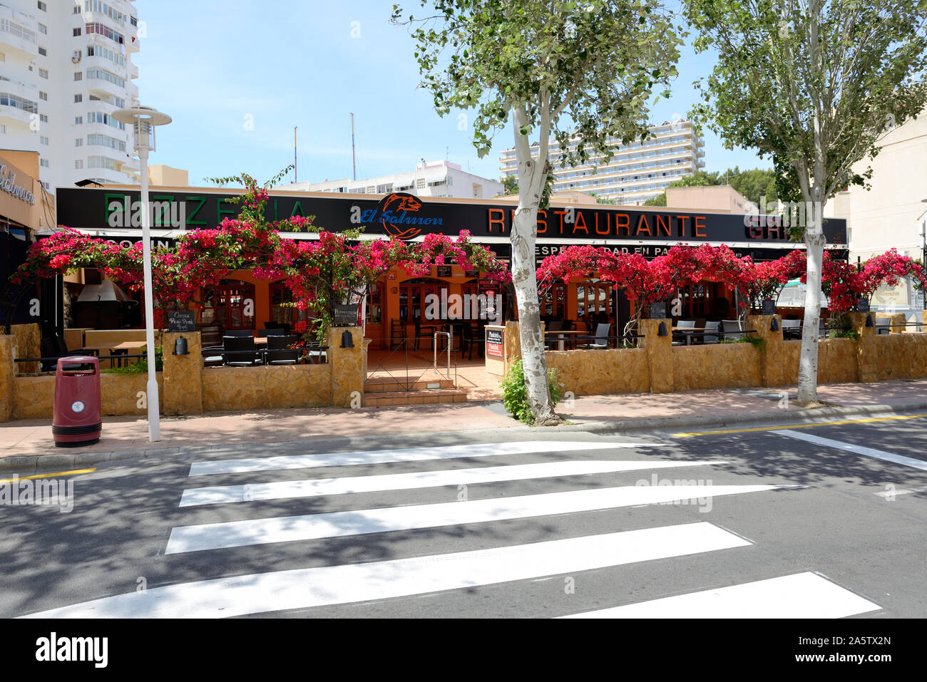 MALLORCA, SPAIN - MAY 29: The restaurant and outdoor terrace near street on May 29, 2015 in Mallorca, Spain. Up to 60 mln tourists is expected to visi Stock Photo