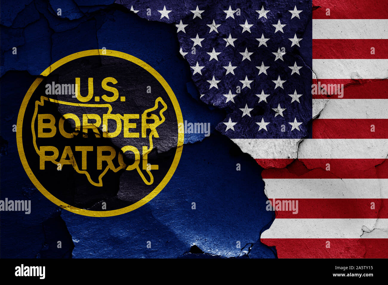 flags of United States Border Patrol and USA painted on cracked wall Stock Photo