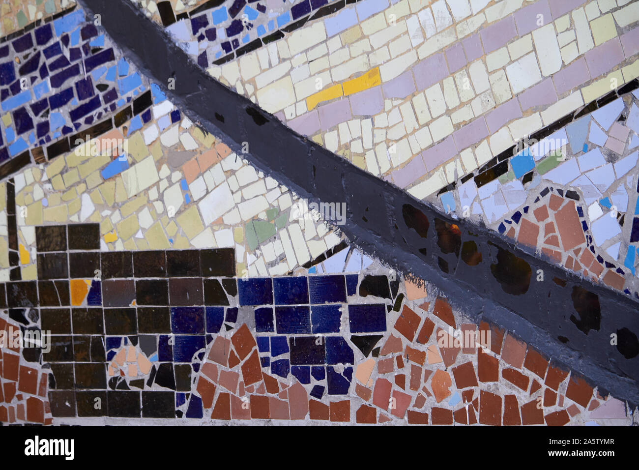 An abstract element of multicolored ceramic mosaic, selective focus. Stock Photo