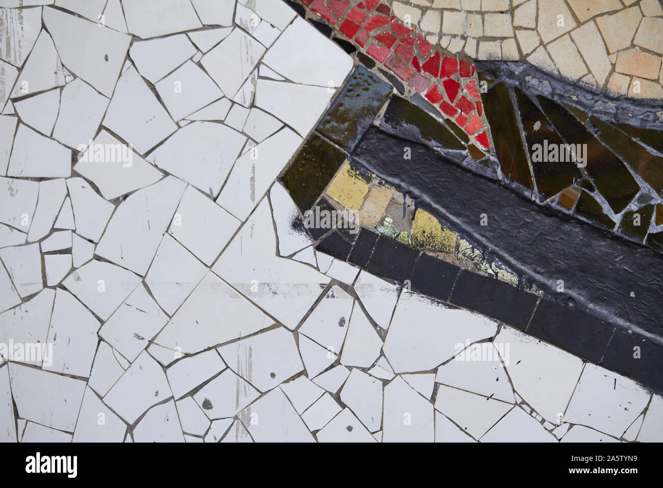 An abstract element of multicolored ceramic mosaic, selective focus. Stock Photo