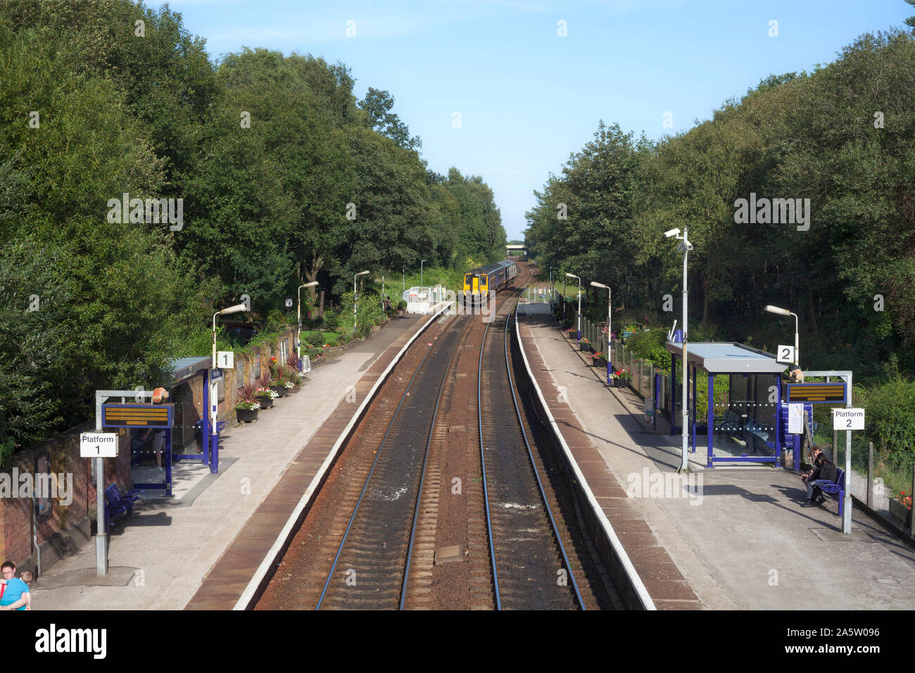 Arriva Northern rail class 156 sprinter train departing from Hindley