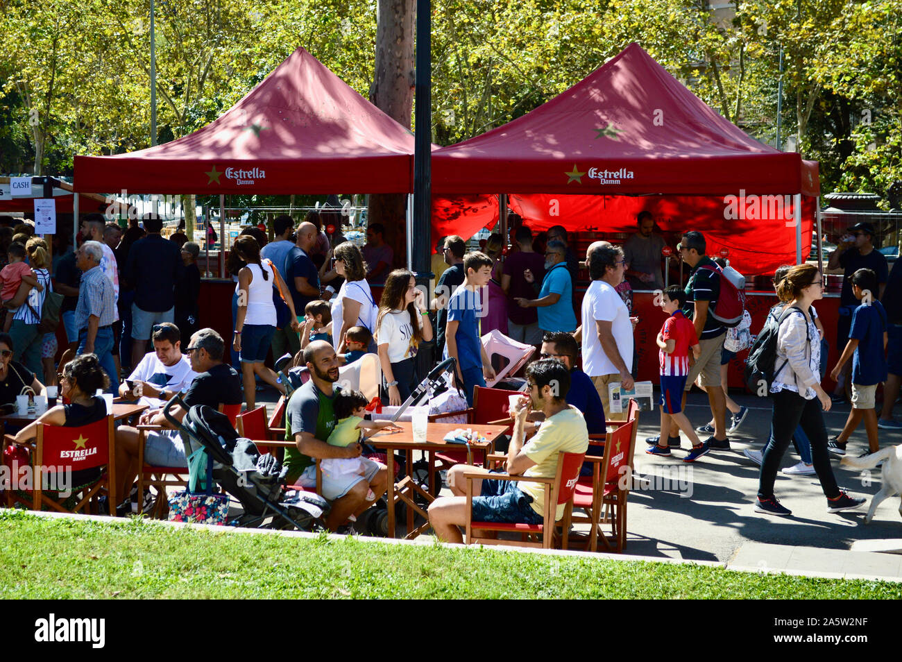 People hanging out at Ciutadella Park during La Merce 2019 in Barcelona, Spain Stock Photo