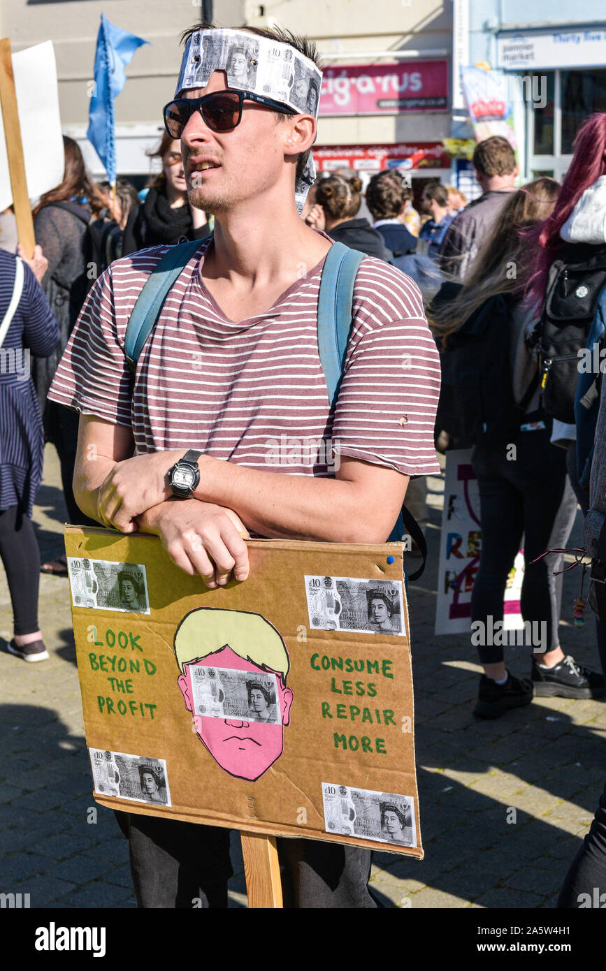 A student participating in the Extinction Rebellion climate strike in Truro City City in Cornwall. Stock Photo