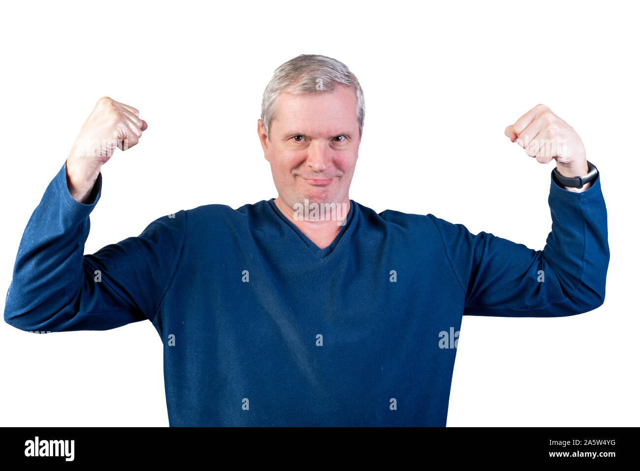Elderly man shows strength. Isolated on a white background. Stock Photo