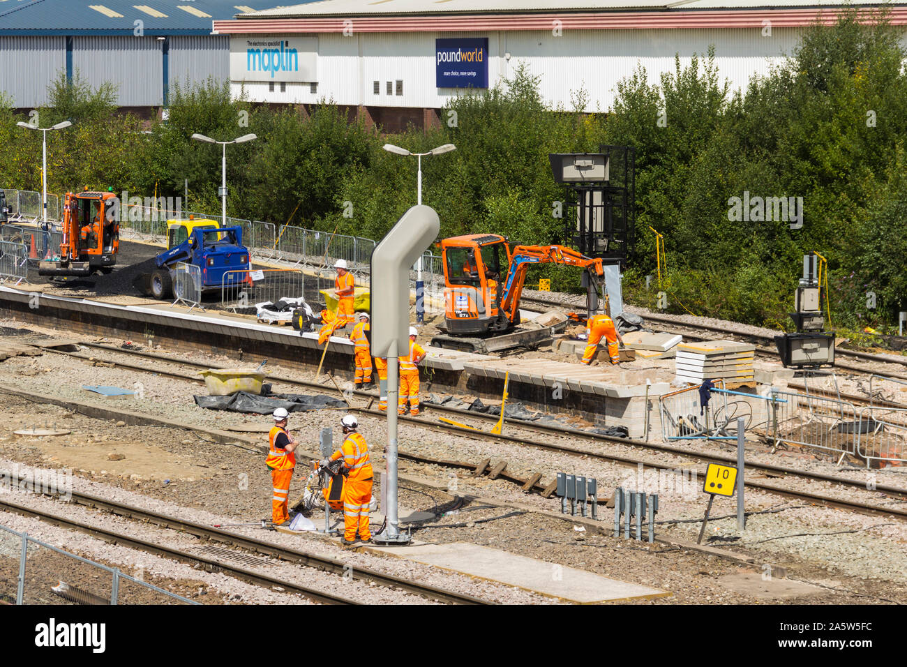 Construction work on platform 2 and new signalling equipment being installed during electrification and capacity extension at Bolton railway station. Stock Photo