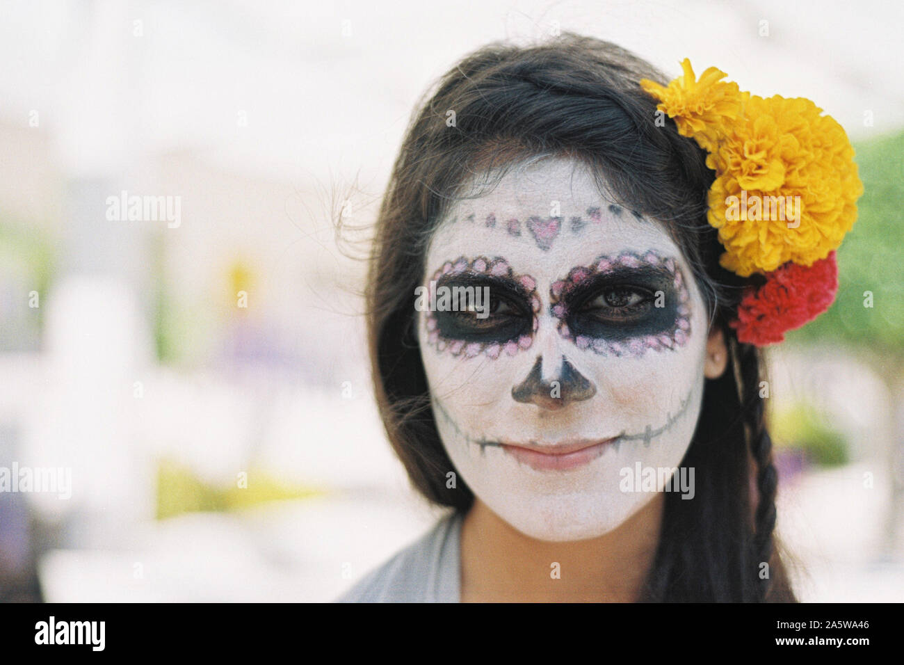 Merida, Yucatan, Mexico - October 30, 2015: Mexican young girl in Catrina makeup for the Day of the Dead or Hanal Pixan celebration Stock Photo