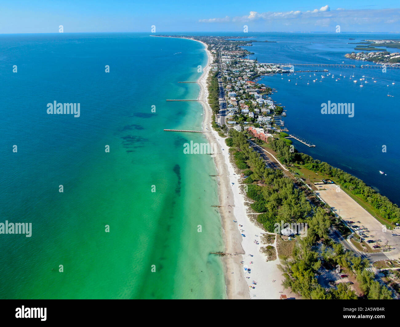 Aerial view of Coquina Beach with white sand beach and the main road