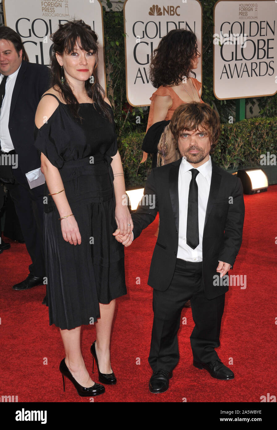 LOS ANGELES, CA. January 15, 2012: Peter Dinklage & Erica Schmidt at the 69th Golden Globe Awards at the Beverly Hilton Hotel. © 2012 Paul Smith / Featureflash Stock Photo